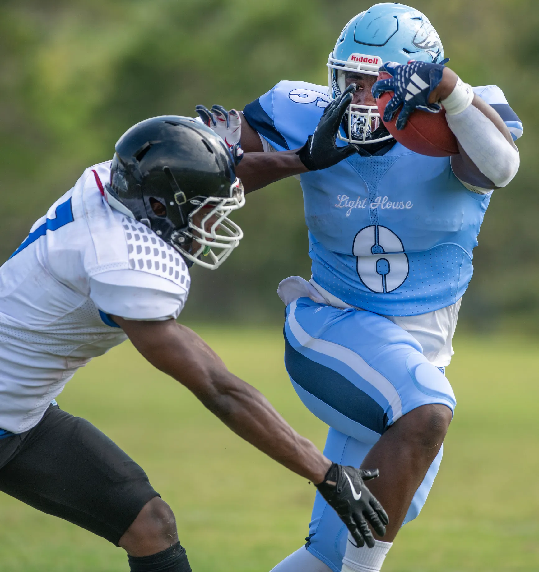 Lighthouse Christian College Makos receiver making a catch