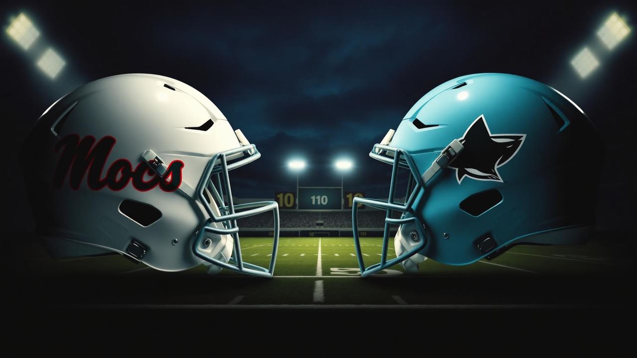 Jacksonville Mocs and Lighthouse Sharks helmets face off under stadium lights